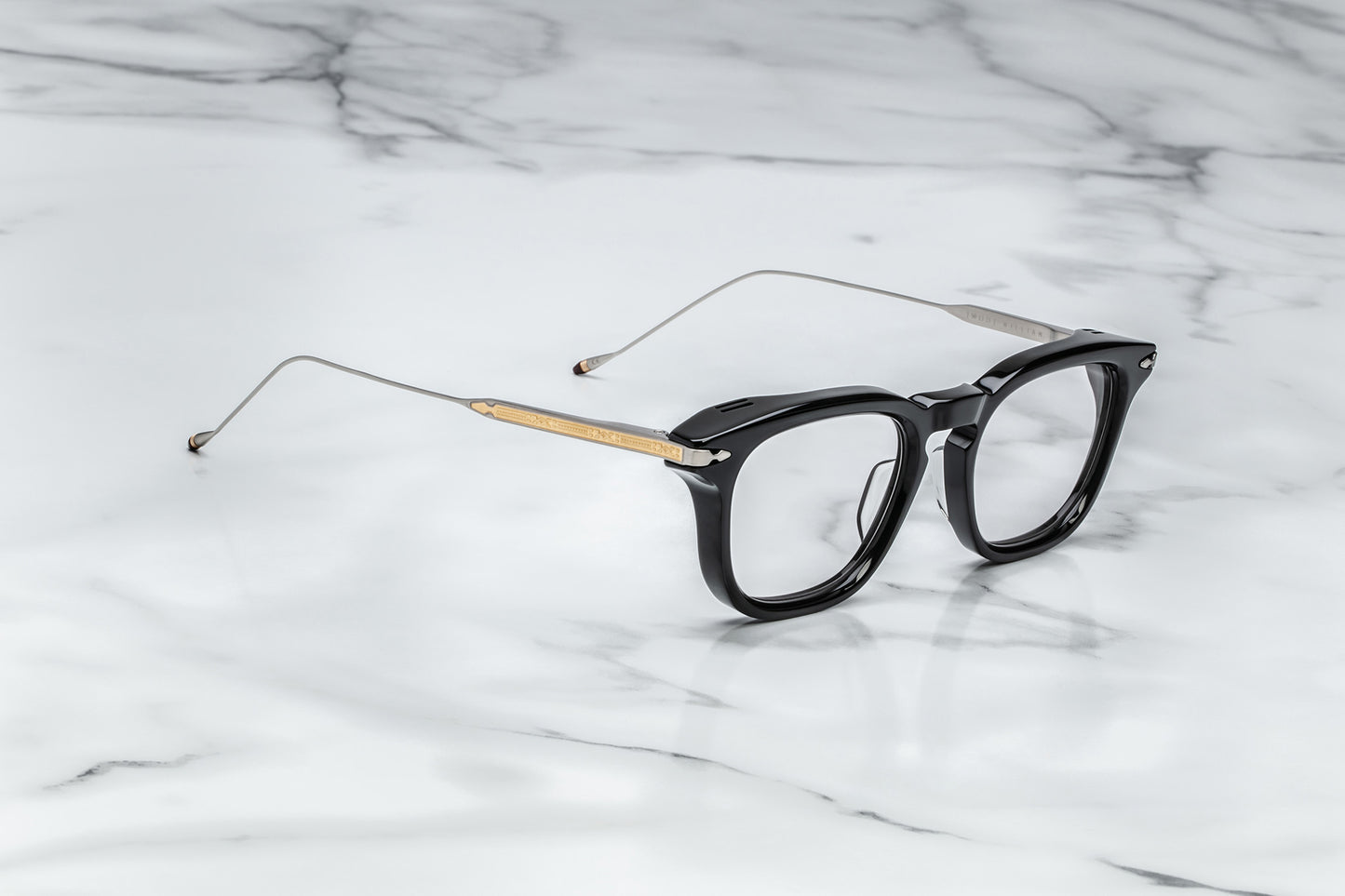 Side view of black round eyeglasses