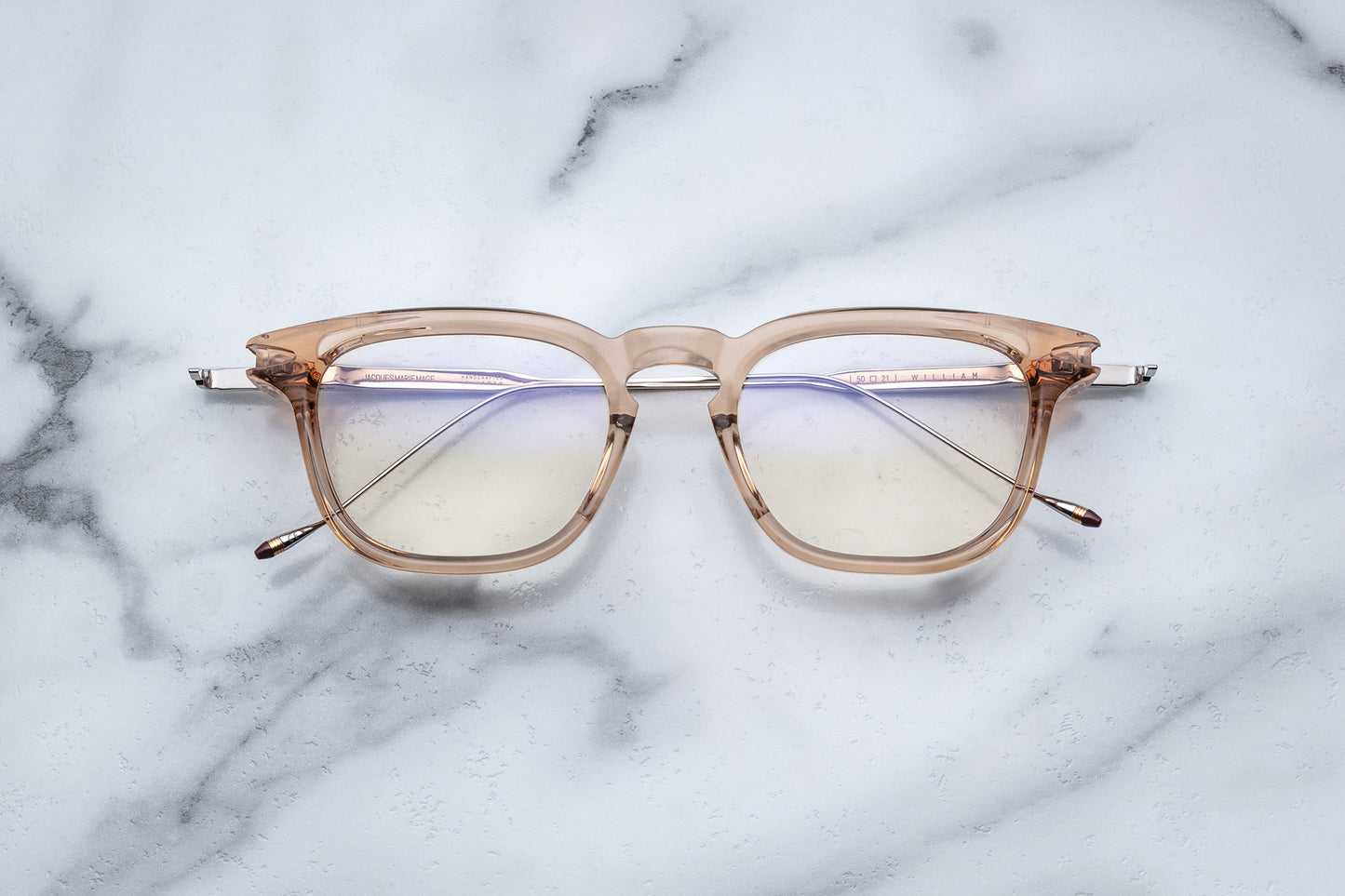 Overhead view of translucent beige round eyeglasses