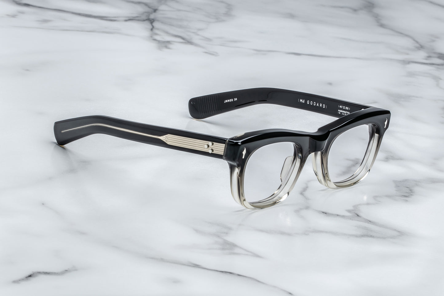 Side view of square eyeglasses with a black to clear vertical gradient