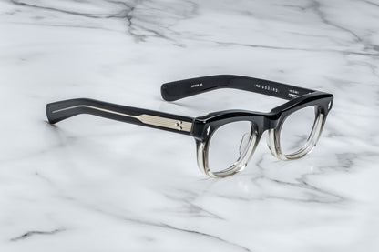 Side view of square eyeglasses with a black to clear vertical gradient