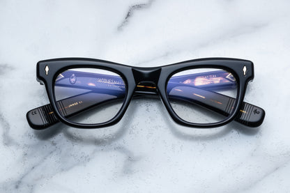 Overhead view of black square eyeglasses
