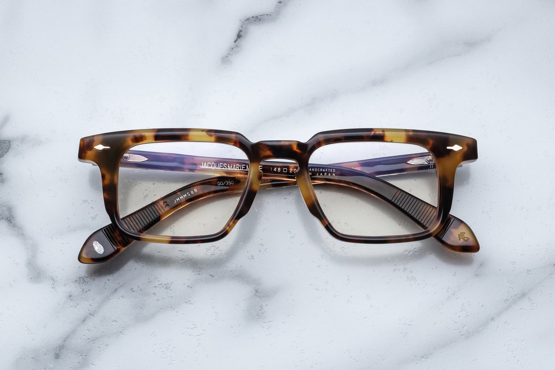 Overhead view of tortoise patterned reading glasses