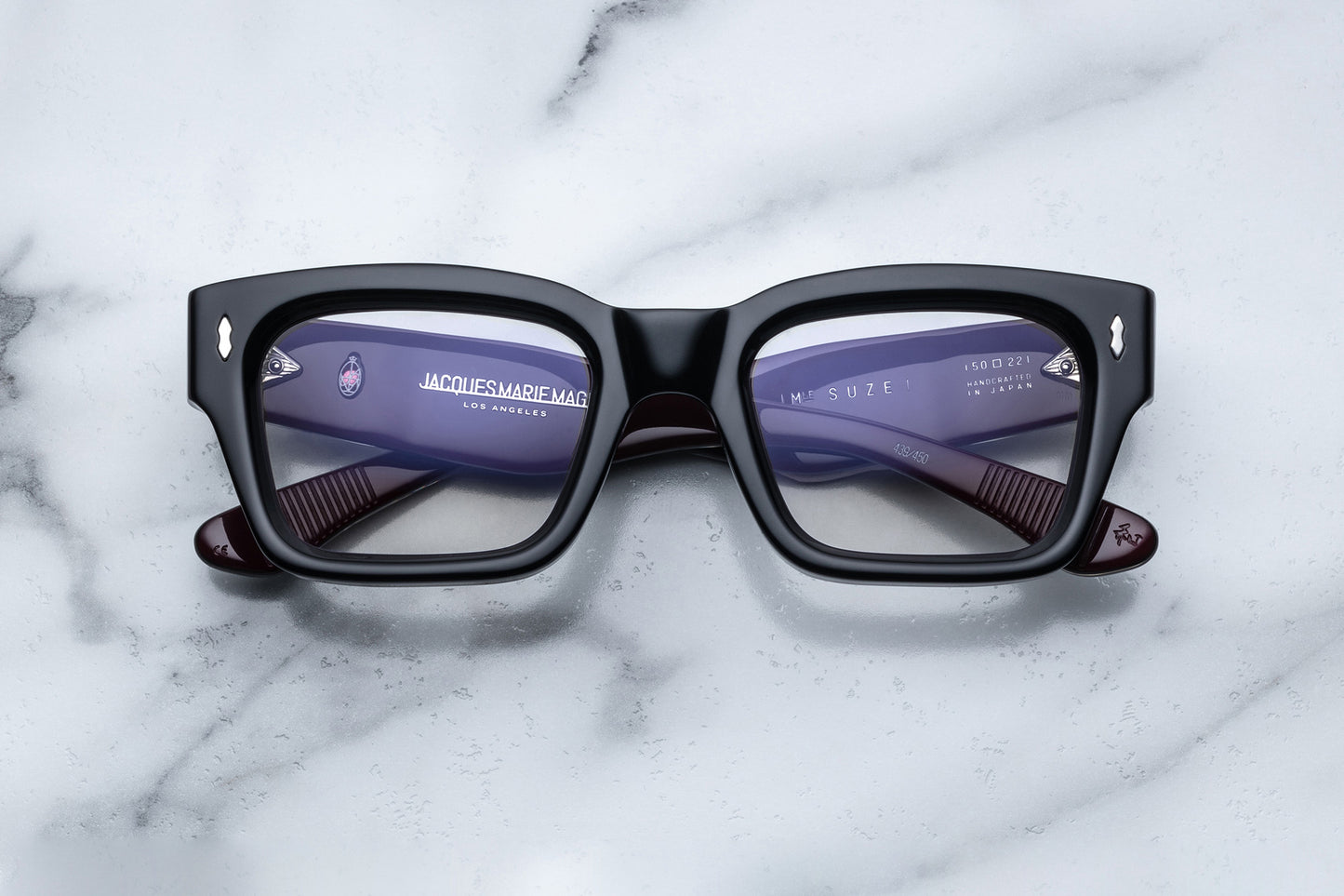 Overhead view of black rectangular eyeglasses