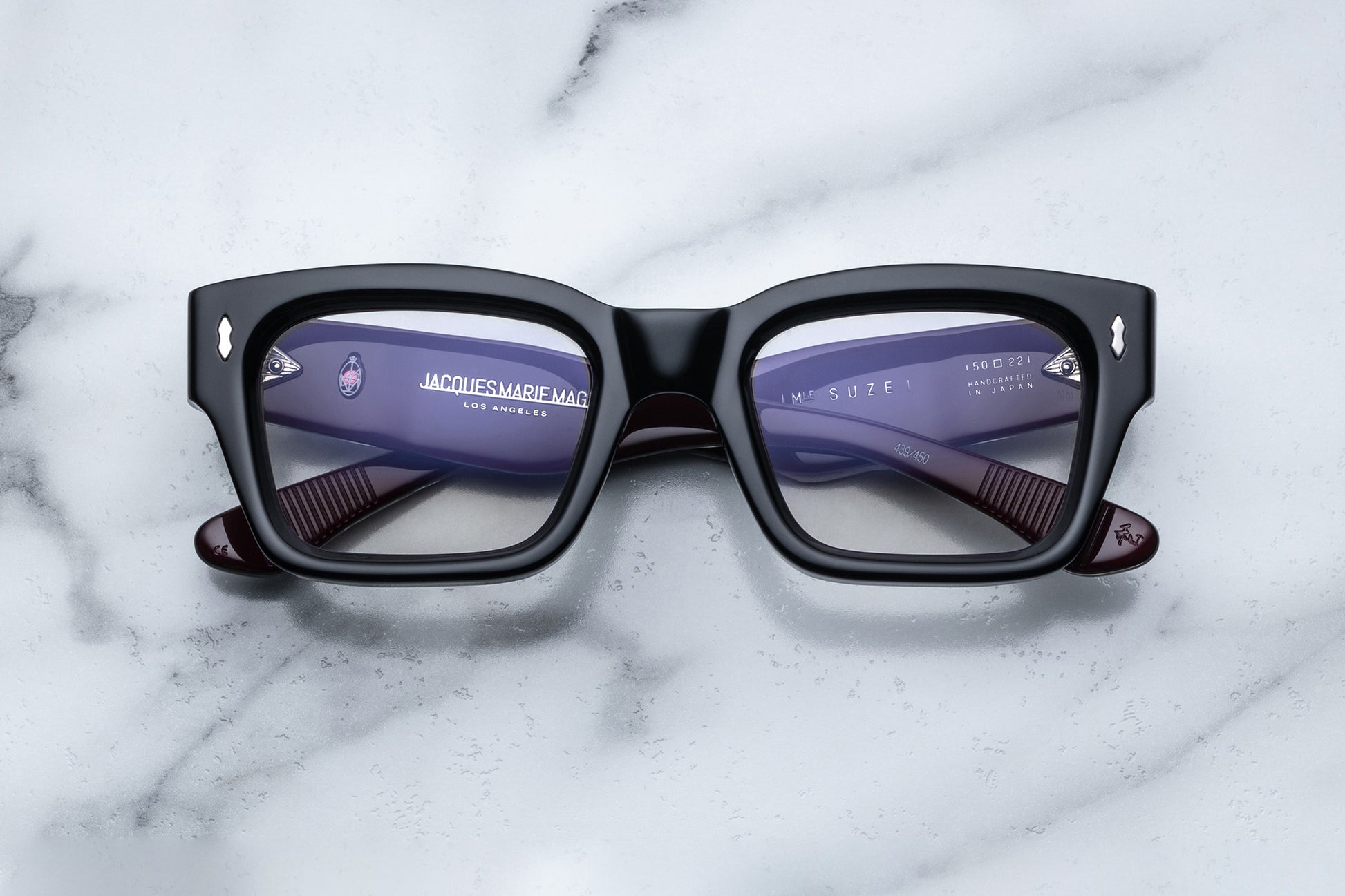 Overhead view of black rectangular eyeglasses