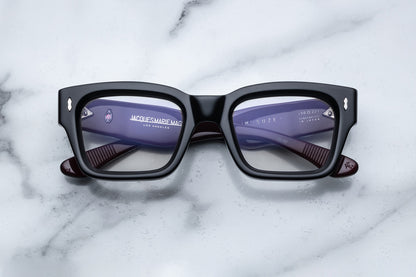 Overhead view of black rectangular eyeglasses