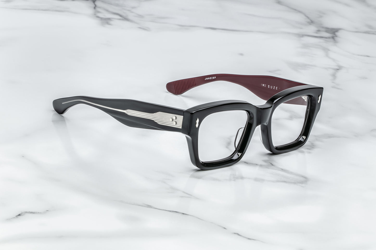 Overhead view of black rectangular eyeglasses