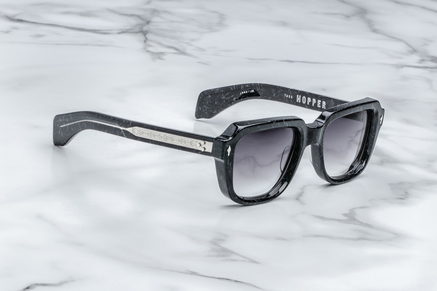 Side view of black sunglasses with black lenses