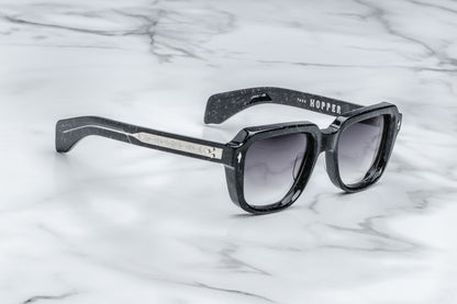 Side view of black sunglasses with black lenses