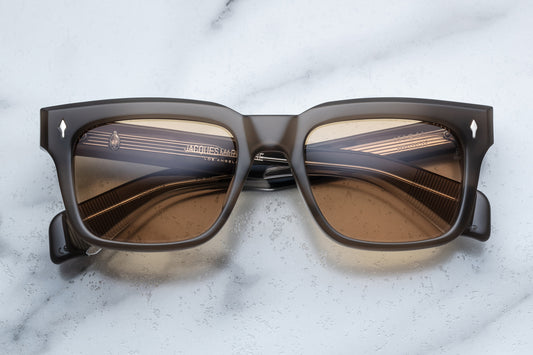 Overhead view of brown rectangular sunglasses with brown lenses