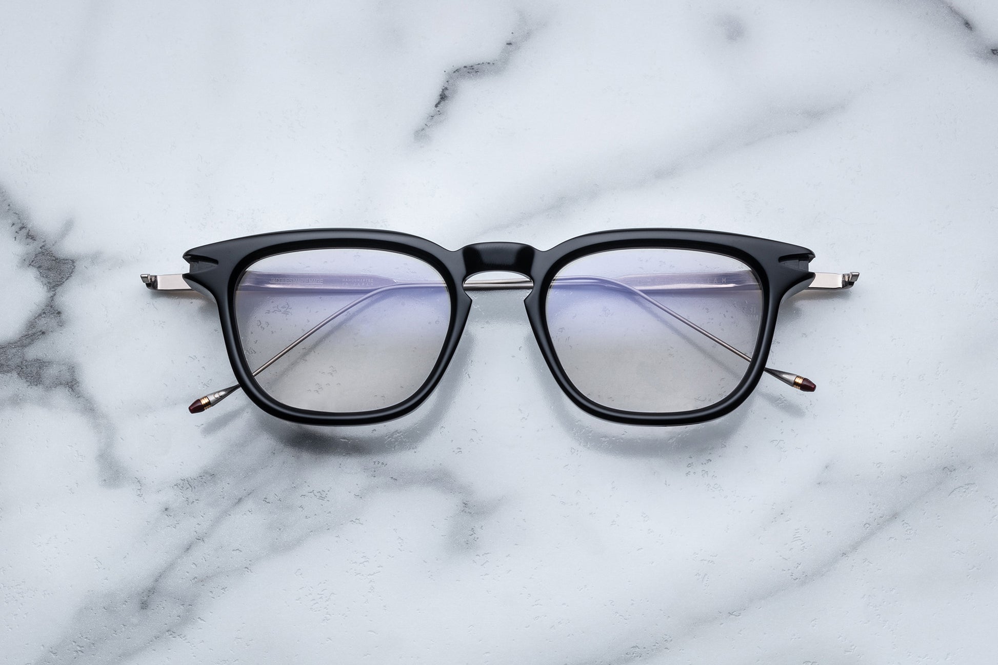 Overhead view of black round eyeglasses