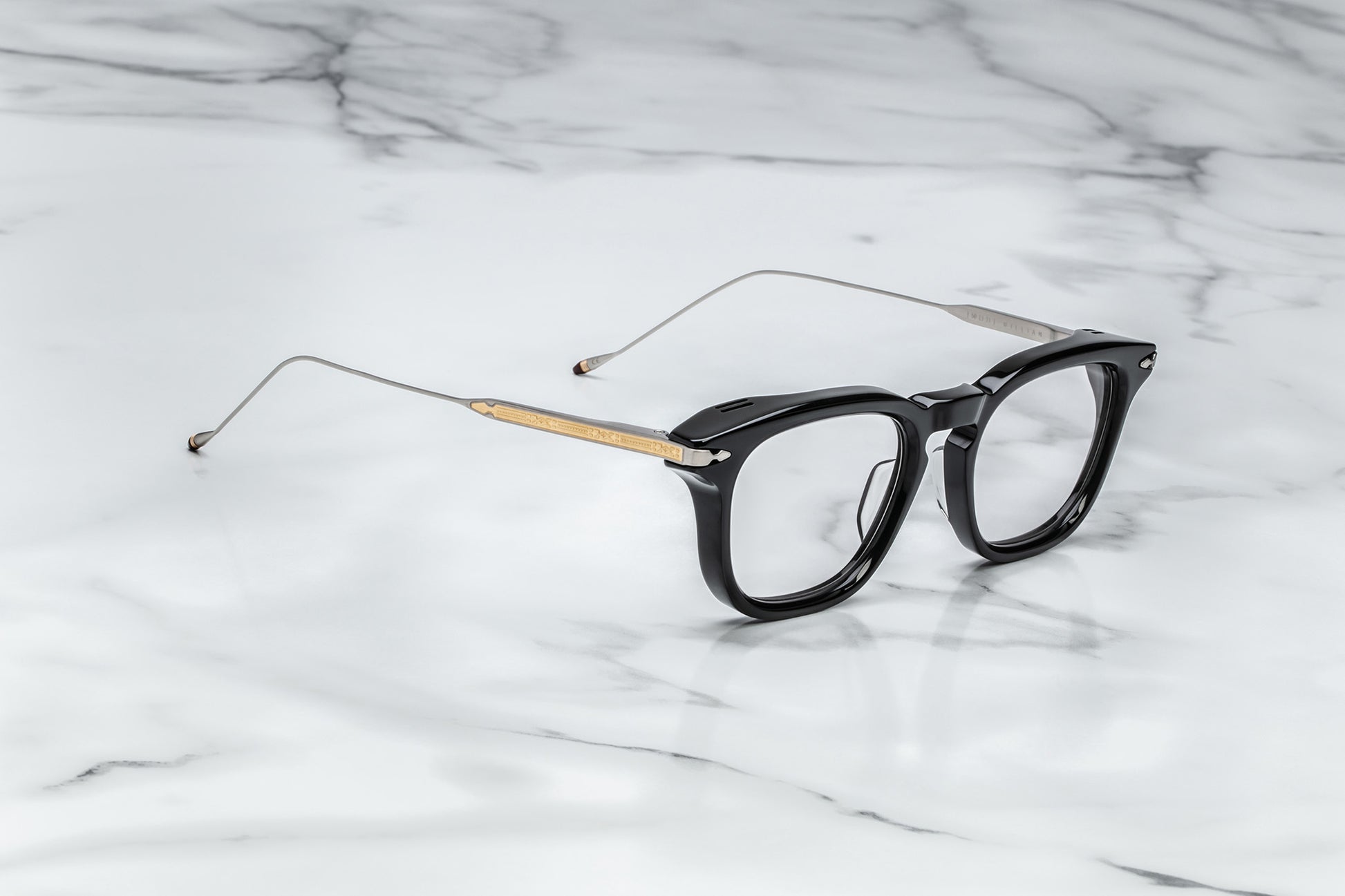 Side view of black round eyeglasses